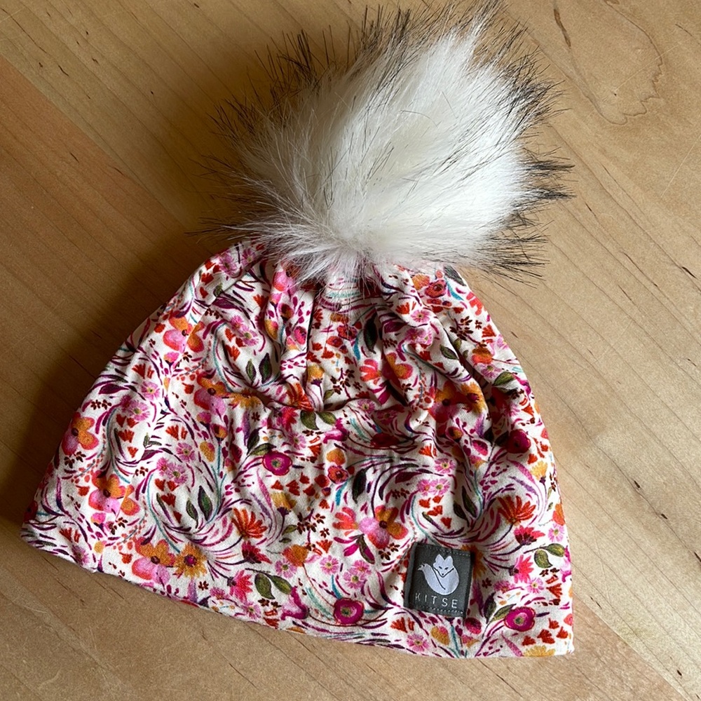 Kitse brand hat. Great for runners. Lightweight with fleece band inside.